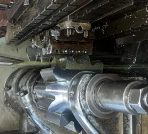 A shaft being cut on the lathe